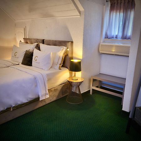 Villa Giardino Heritage Boutique Hotel Μπολ Δωμάτιο φωτογραφία